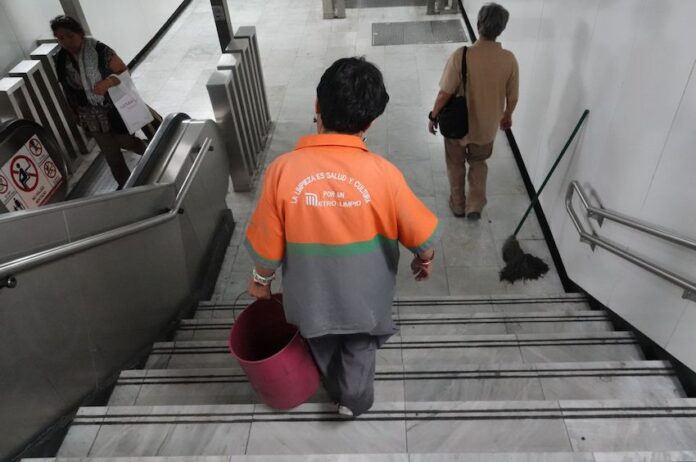 Cleaner working in the Mexico City metro