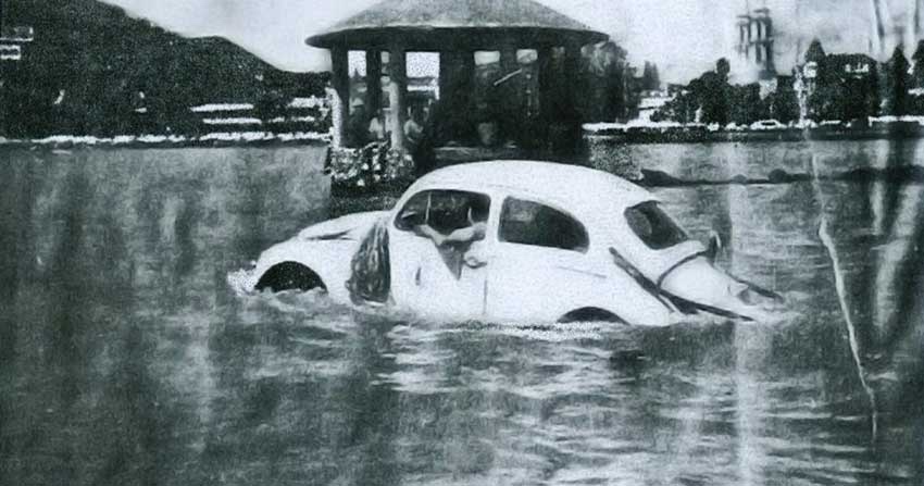 A Volkswagen Beetle drives across lake Chapala