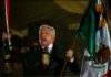 Andres Manuel López Obrador waving a Mexican flag during Mexican Independence Day celebrations