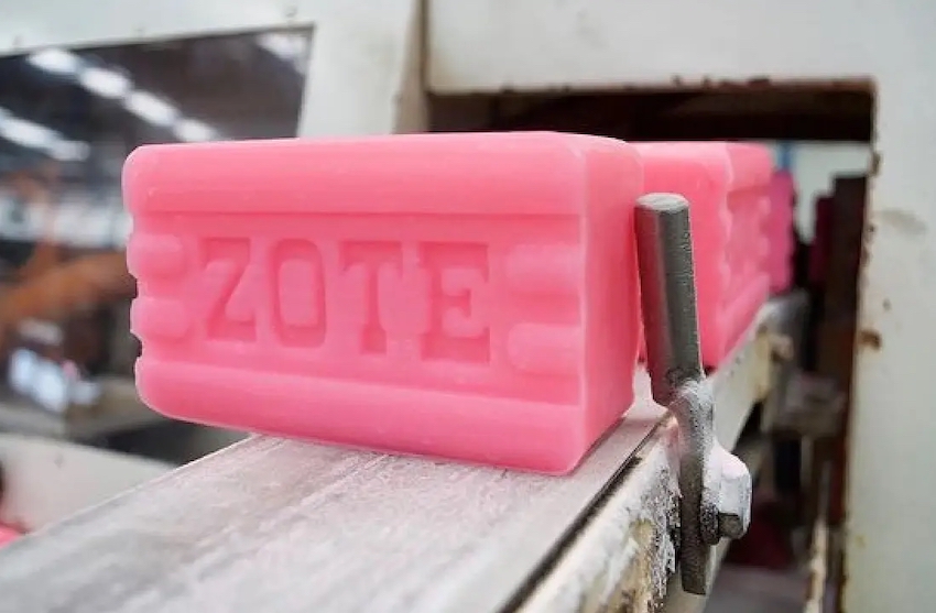 Bars of pink Jabón Zote being manufactured