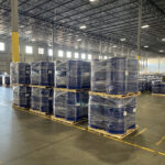 Barrels of precursor chemicals in a warehouse