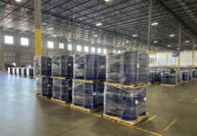 Barrels of precursor chemicals in a warehouse