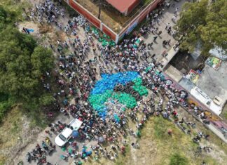 aerial view of blue trash bags in street