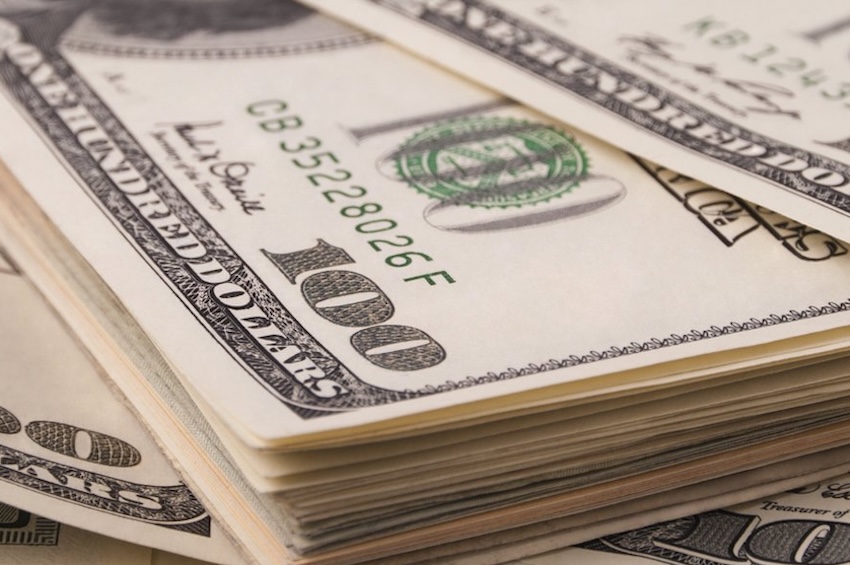 100 dollar bills in stack