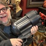 Del Toro with weapon prop
