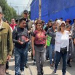 Clara Brugada with team in Iztapalapa following a flood