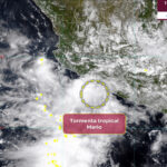 A map of mexico showing clouds off the southwest coast and a circle indicating the location of Tropical Storm Mario