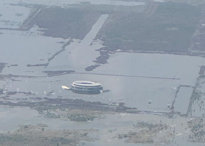 an aerial photo shows the terminal of Mexico City's canceled airport sinking into Lake Texcoco