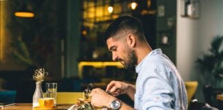 A man sitting alone in a restaurant