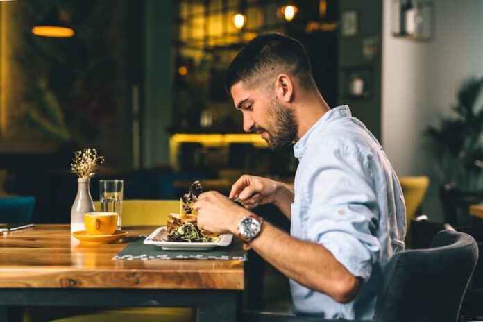 A man sitting alone in a restaurant