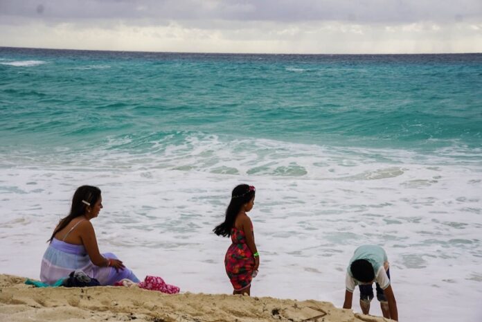 waders at a Cancún beach