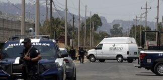 forensic van parked outside a homicide