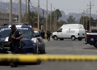 forensic van parked outside a homicide