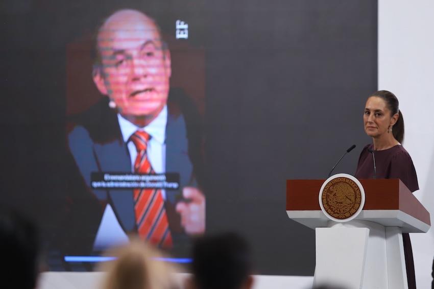 Sheinbaum speaks before an image of former president Felipe Calderón
