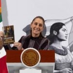 Sheinbau, showing her book