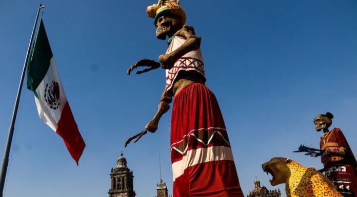 The annual "mega ofrenda" has taken over Mexico City's Zócalo as Mexicans prepare to celebrate Day of the Dead on Nov. 2.