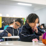 Children studying in a classroom