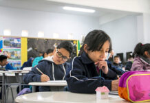 Children studying in a classroom