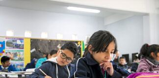 Children studying in a classroom