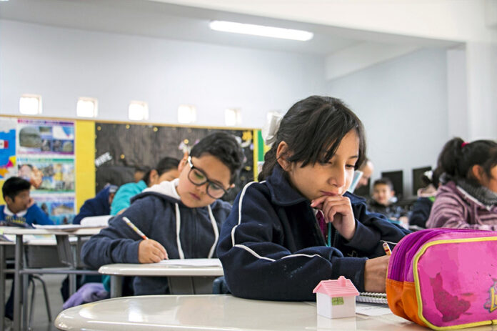 Children studying in a classroom