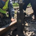 CDMX-QRO train route will take a detour to save ancient rock art a person laying train tracks