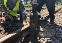 CDMX-QRO train route will take a detour to save ancient rock art a person laying train tracks