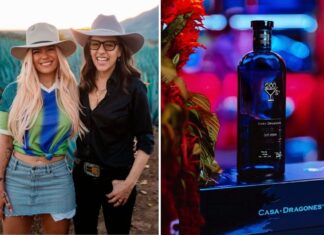 Singer Karol G poses for a photo with Casa Dragones' Bertha González Nieves