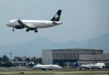 Trump administration revokes 13 flight routes from Mexico to US volaris plance in air