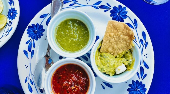 A plate with three different types of Mexican salsa