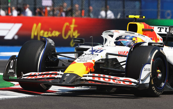 cdmx A Formula 1 race car drives in front of a sign reading Mexico City