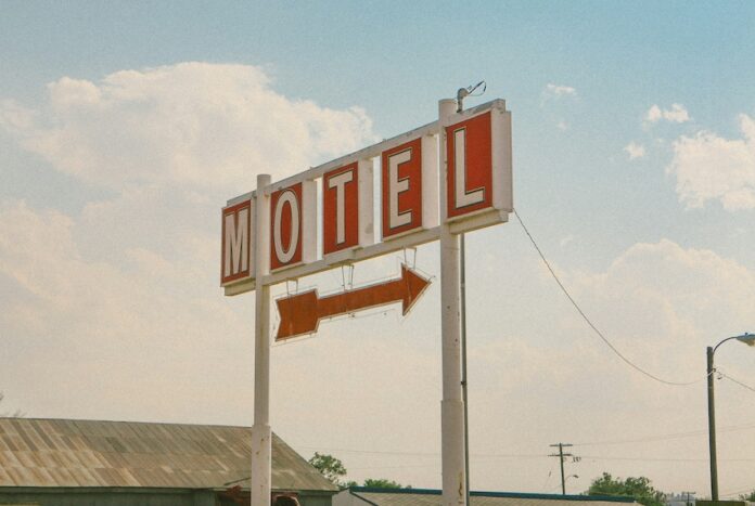 matthew-smith-9CV6WrxxdrM-unsplash A motel sign