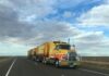 a heavy-duty truck going down the highway