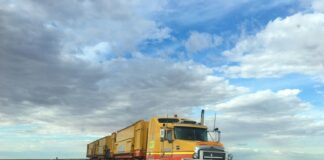 a heavy-duty truck going down the highway