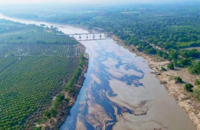 A plume of oil in a river
