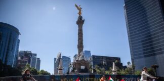 Cyclists enjoy a car-free Paseo Dominical along Reforma Avenue in Mexico City.