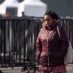 A woman bundled up due to cold