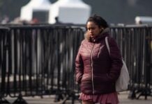 A woman bundled up due to cold