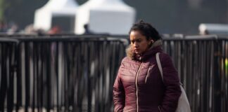 A woman bundled up due to cold