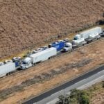 trucks blocking highway