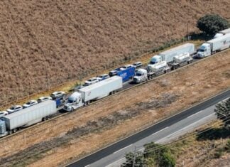 trucks blocking highway