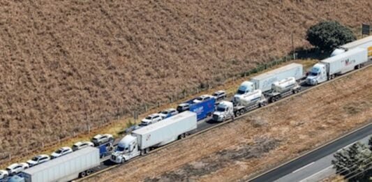 trucks blocking highway