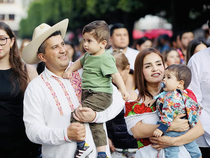 Uruapan former mayor Carlos Manzo, his wife and now-mayor Grecia Quiroz, and their children at a public event