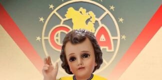 A baby Jesus doll dressed in a Club America soccer uniform