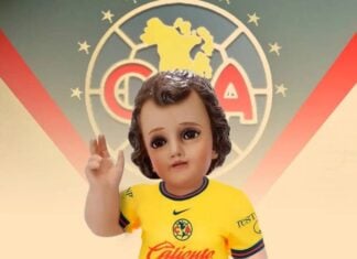 A baby Jesus doll dressed in a Club America soccer uniform