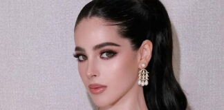 A closeup photo of Miss Universe Mexico, Fatima Bosch, with a sash and heavy makeup