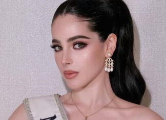 A closeup photo of Miss Universe Mexico, Fatima Bosch, with a sash and heavy makeup