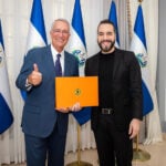 Salinas Pliego poses for a photo with El Salvador President Bukele