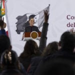 President Sheinbaum looks out over the press pool at her morning conference