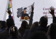 President Sheinbaum looks out over the press pool at her morning conference