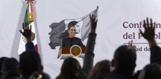 President Sheinbaum looks out over the press pool at her morning conference